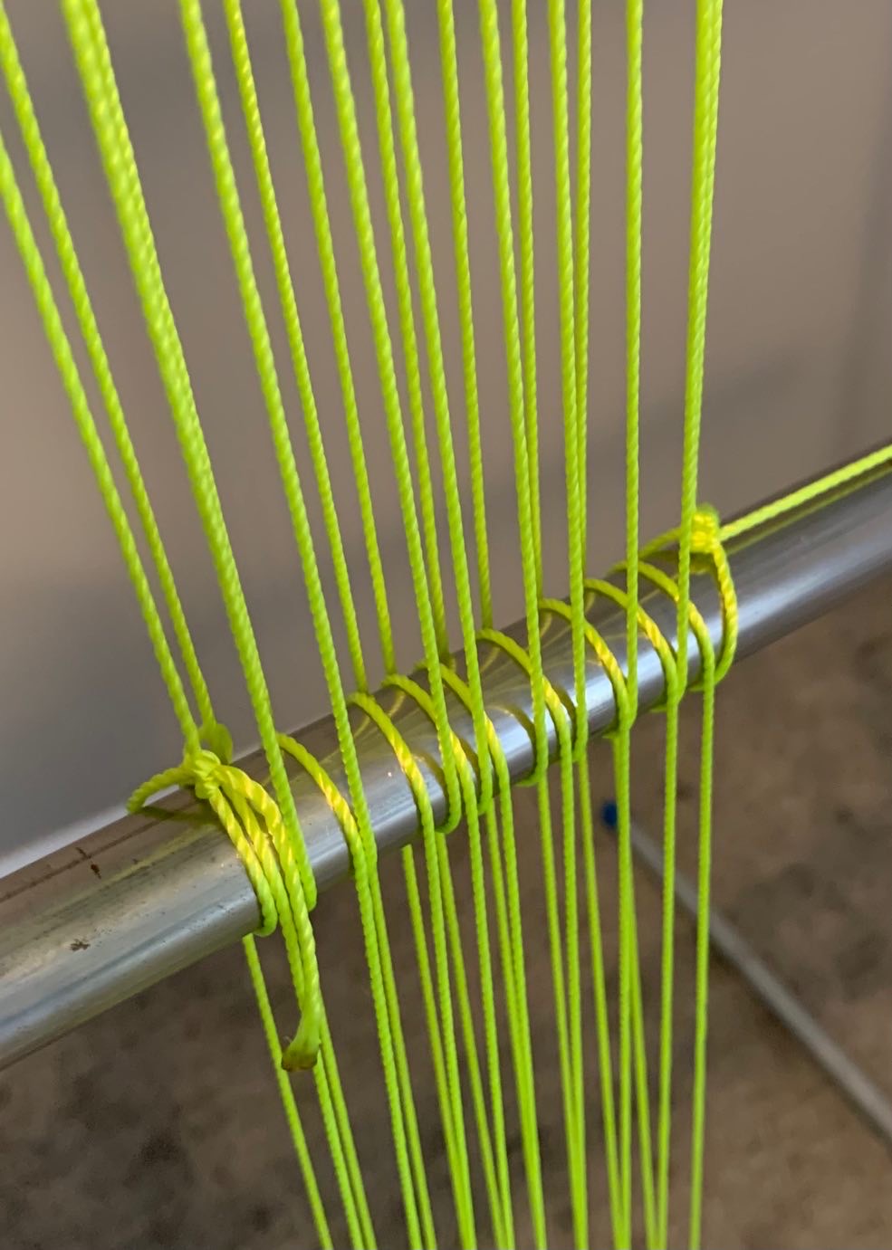 Continuous Warping Method - Warps wrapped around warping bar